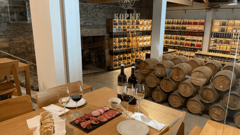 Quinta de São Luiz - Private Wine Tastings Online - Wine Glass and Bottle.